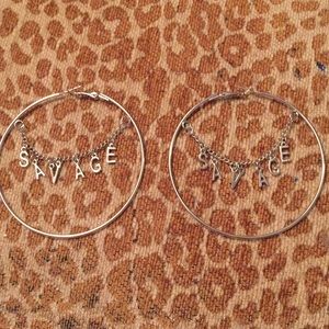 “Savage” hoop earrings Hot Topic
